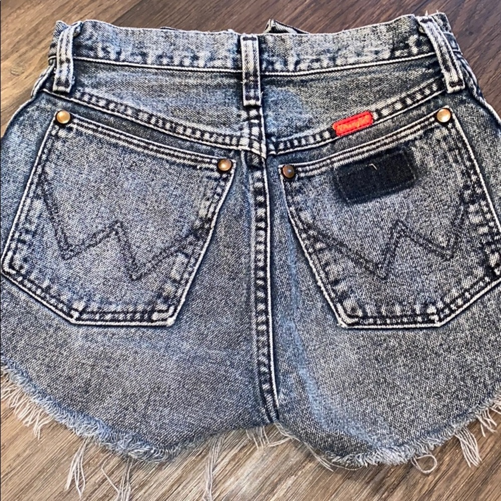 Wrangler Distressed black cut off shorts.